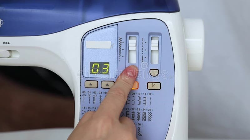 Selecting a Stitch on the Sewing Machine Display. Computerized Home ...